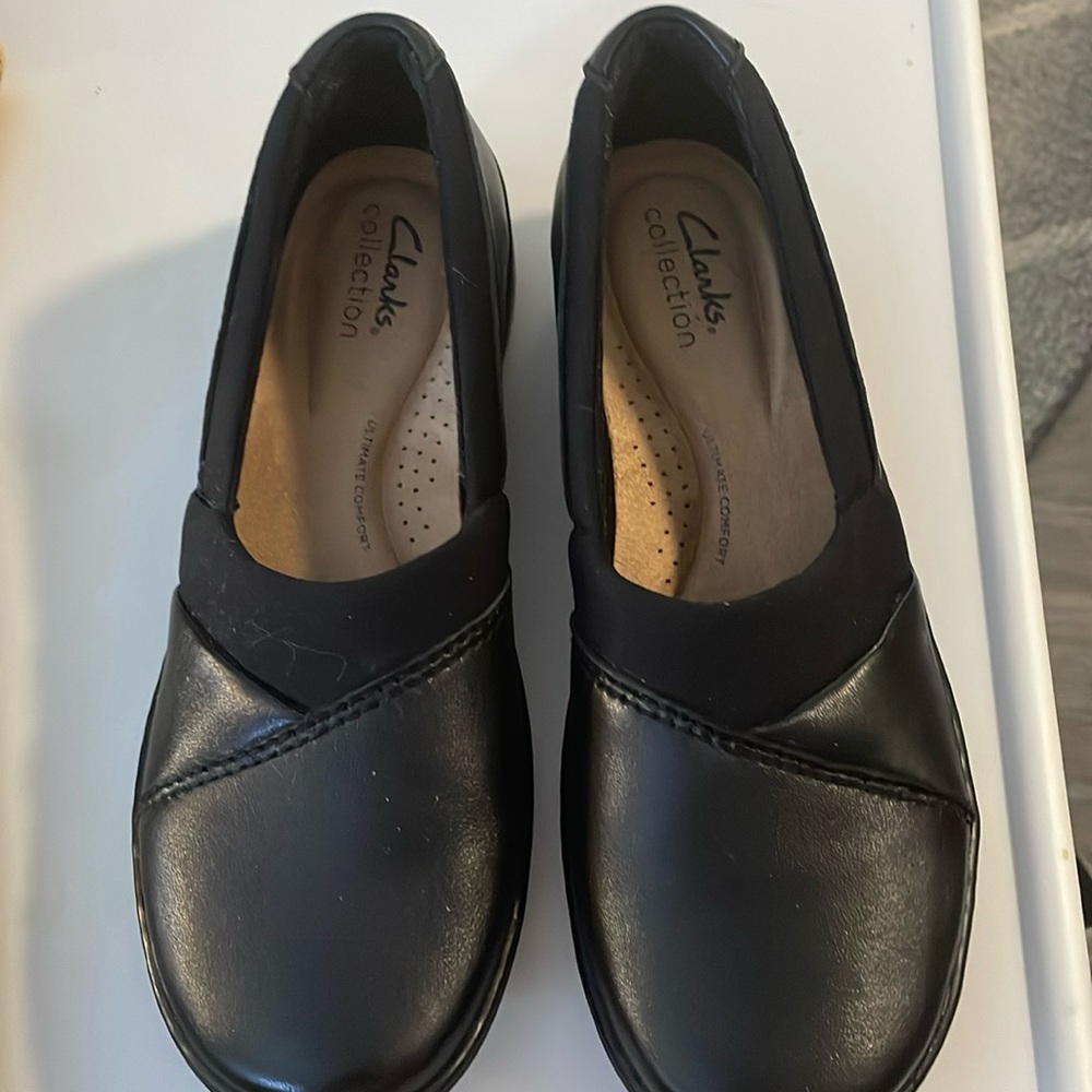 Clarks Size 7 leather slip on style shoes
